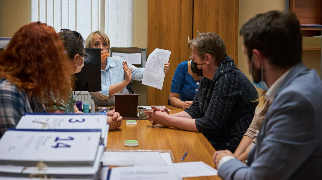 investigators analyzing documents